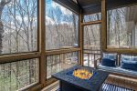 Main Level Screened Porch with Seating and Gas Fire Table